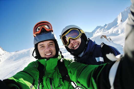 two skiers on a mountain